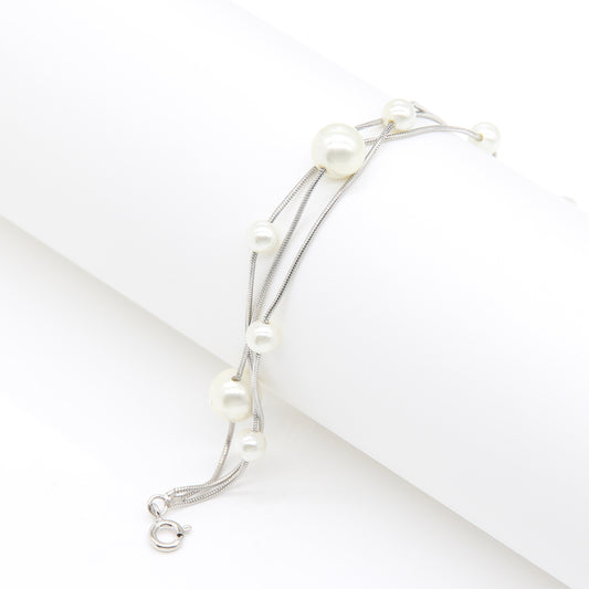 Sterling silver Multi-Strand Pearl Station bracelet polished finish