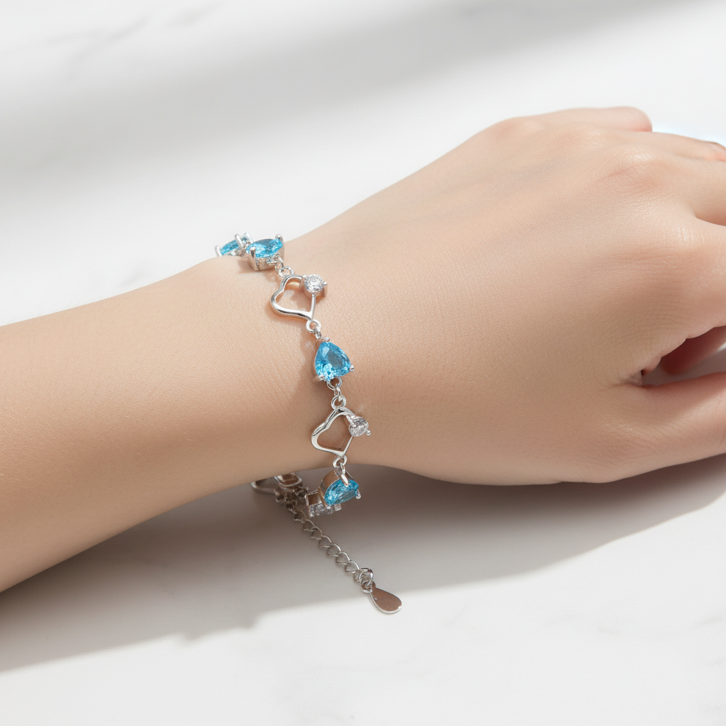 Sterling silver Aqua Blue Topaz Heart & Teardrop Link bracelet polished finish