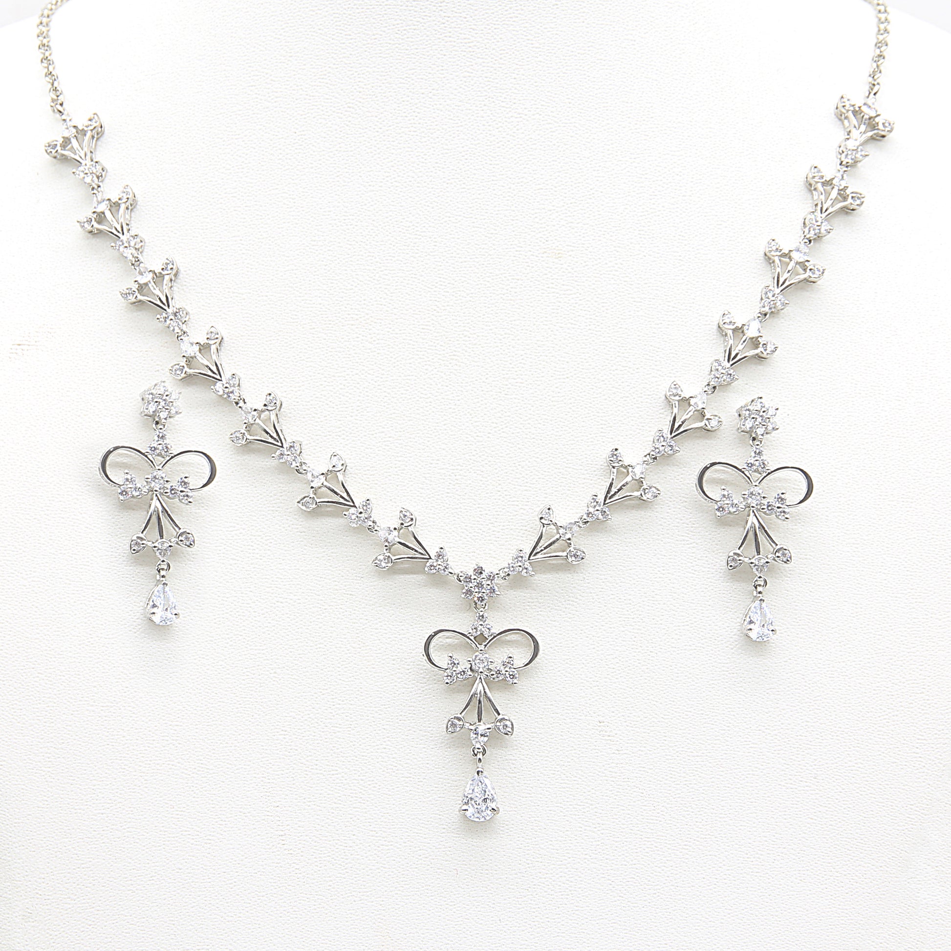 Sterling silver Crystal Bow necklace and earring set polished finish