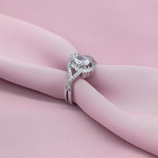 Oval Halo Baguette Twist Bypass Ring from TimelessWhims, view 4